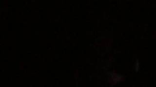 Firing out window at night
