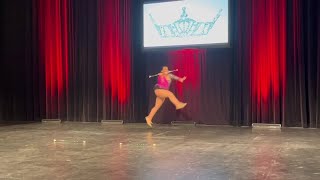 Rosie Miliacca baton twirls during talent section