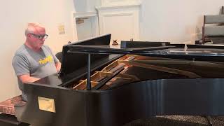 Rick Robertson plays “Above the Clouds”