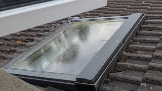 Cleaning my sky light window.