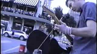 Croman-ized Sultans Of Swng, adaptation to solo guitar (altered tuning and base string self-accompaniment) & vocal, highlights excerpts of 7-08 performance in k.c.'s plaza