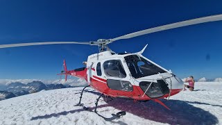 Flying to the top of Eiger Glacier by Helicopter. Swiss Alps 4k