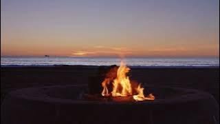 A crackling bonfire by the beach.