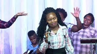 kayesu loice worshipping at holy spirit fire church