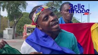On January 1, 2026, these young men arrived in the hall with various Haitian flags.