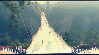 China's glass-bottomed bridge welcomes first visitors