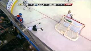 Magnus Paajarvi hits Stephane Robidas