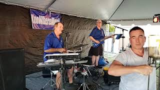 'KnoWhereMen' at Pinellas Park Sacred Heart Festival April 22, 2023,