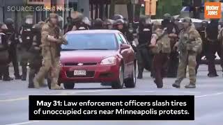 COPS SLASHING PROTESTERS CAR TIRES
