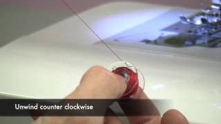 How to insert a top-loading drop-in bobbin