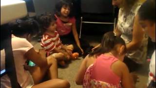 Children who live in Kalmia public housing in north Boulder use iPads in literacy lessons in a summe