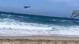 Insane Moment Plane Crashes Into Ocean With Banner