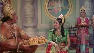 Sita cooks for Hanuman