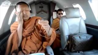 Buddhist monks travel on private jet