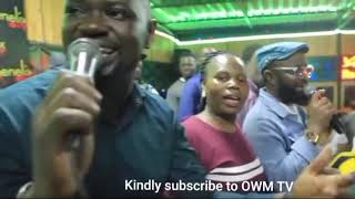 Prince Indah featuring John junior on a live performance .