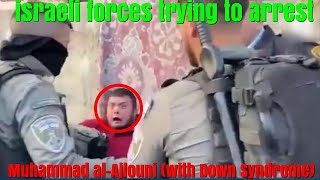 israeli forces trying to arrest Muhammad al Ajlouni with Down Syndrome