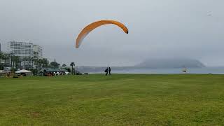 Paraglider taking off from Lima Peru Cliff [Not sure I would do this]