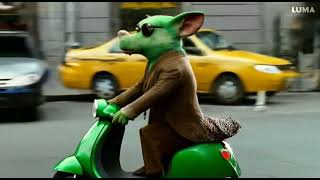 Giant green rat with sunglasses riding a vespa