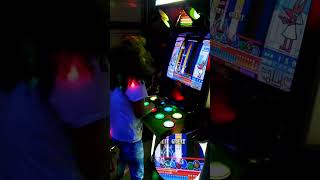 Pop'n Music Ancient Heritage EX Level 47 my, now, 15 year old clearing the song at our home arcade